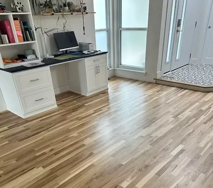 Refinished hardwood floor in a Denver home office