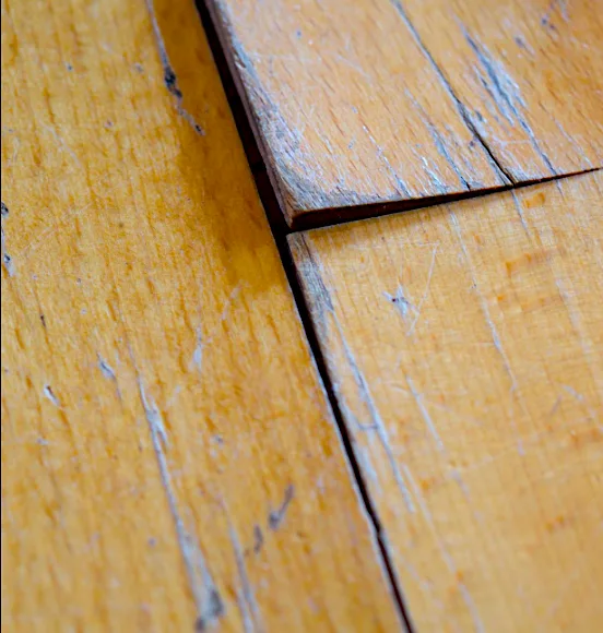 Close view of a damaged board before replacement