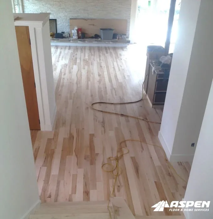 Hallway floor part way through a repair