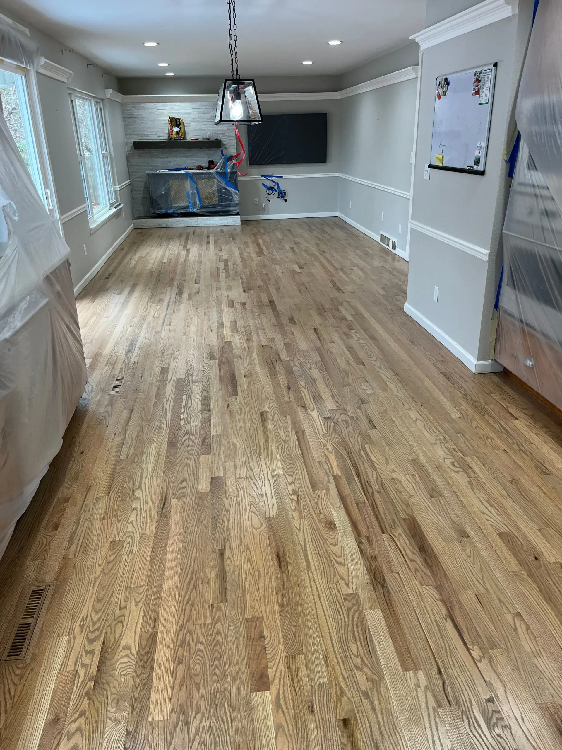 Light oak floor in a room being prepared for finishing