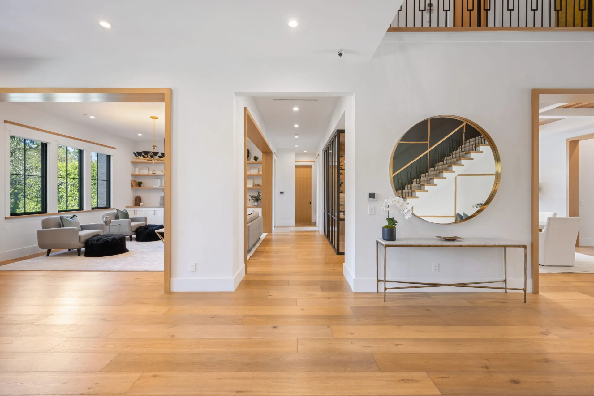New hardwood floor through an entry and hallway