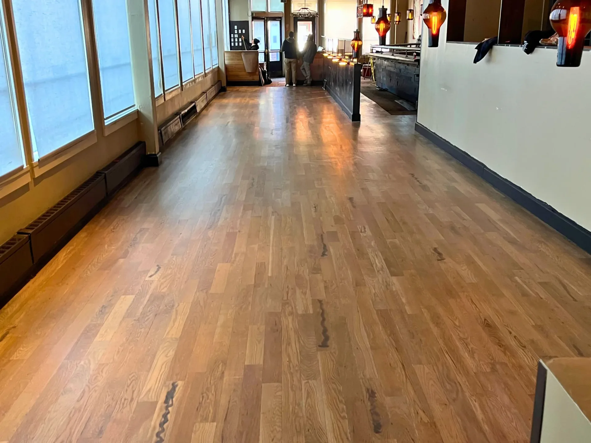 Wood floor sanded and finished on site in a Denver commercial space