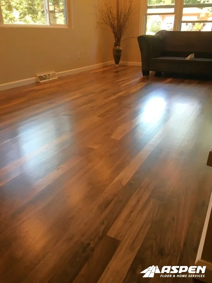 Dark stained hardwood floor after installation