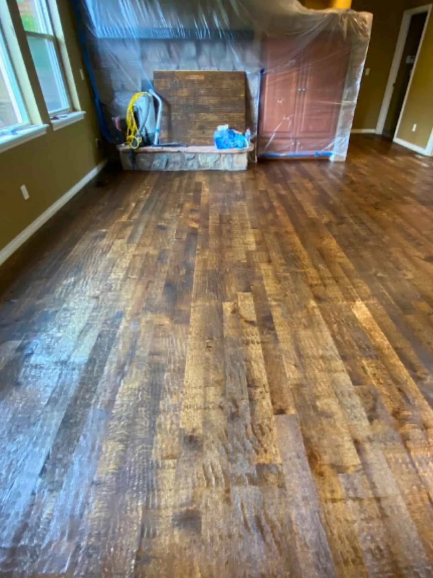 Worn and weathered floorboards with the finish gone and the grain raised