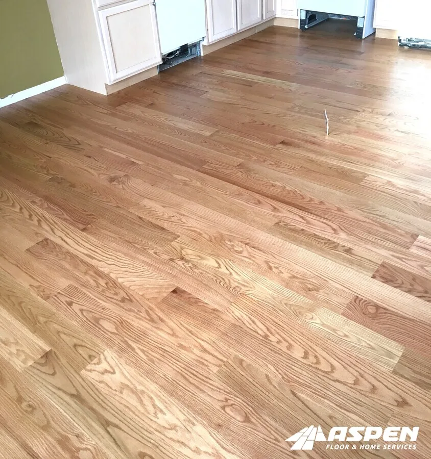 Light oak boards laid across a room