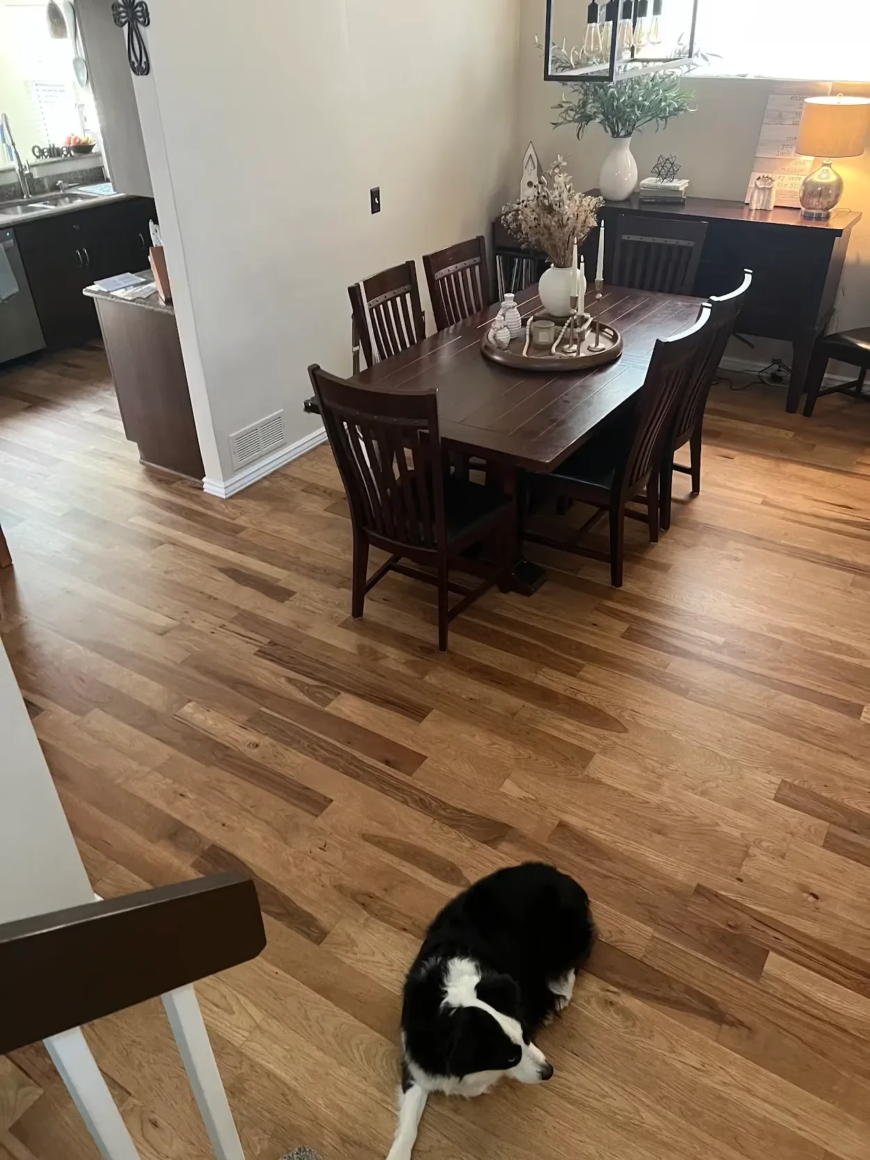 Refinished hardwood floor in a Denver dining room