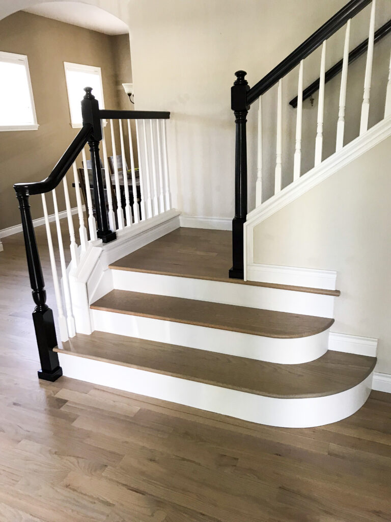 White oak staircase hardwood installation in Denver, Colorado, with a light natural finish