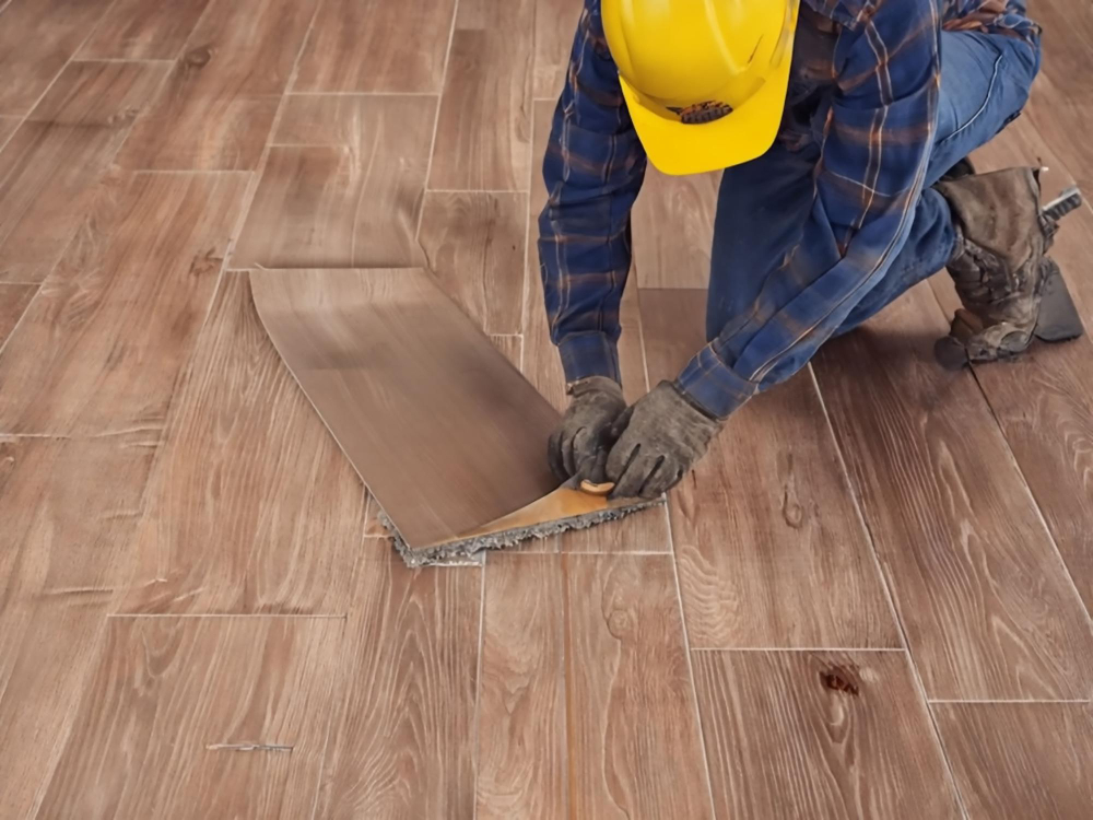 Inspection of hardwood floors by professional contractor