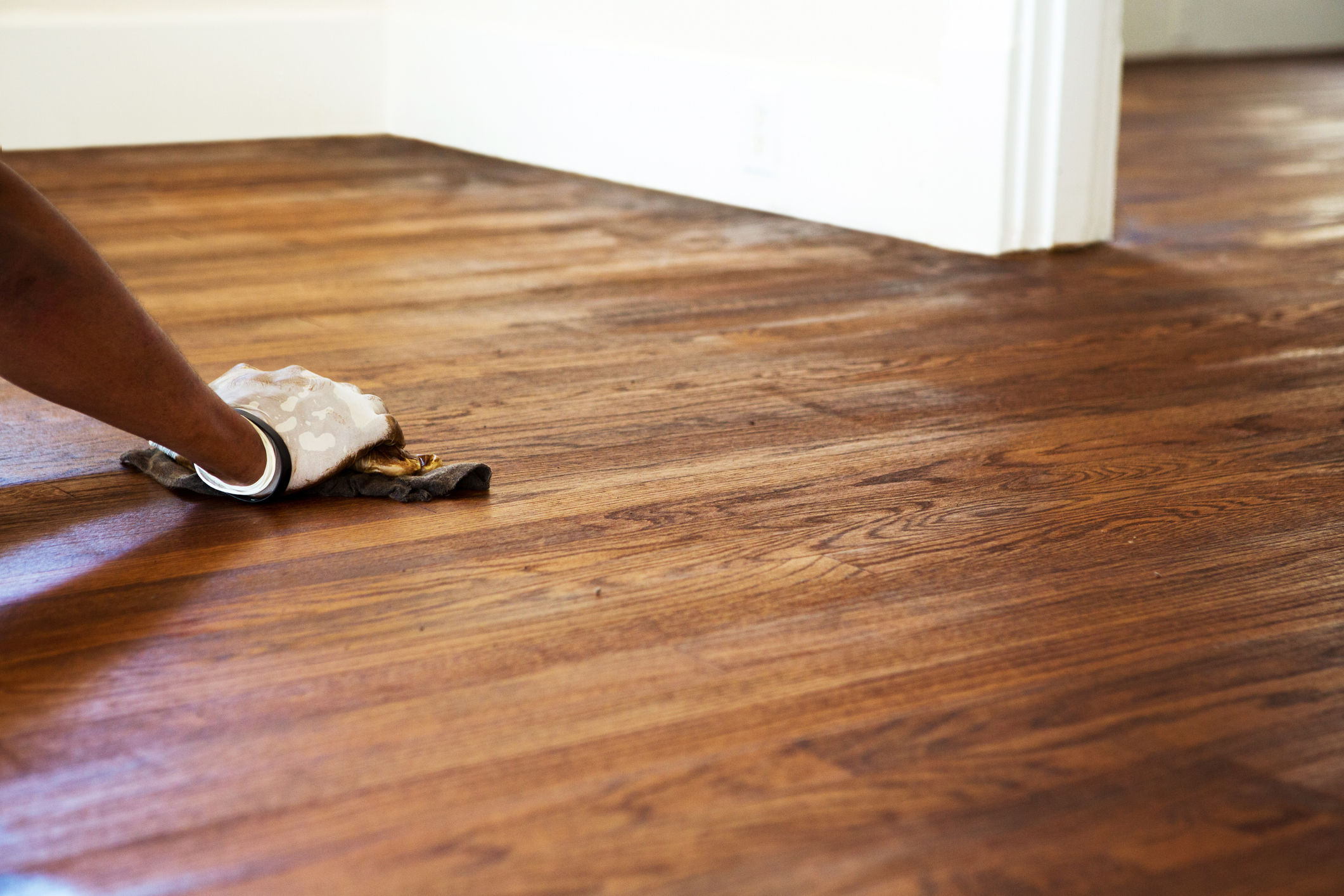 Applying finish to newly sanded hardwood floor