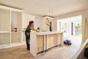 Professional contractors working on custom kitchen remodeling projects