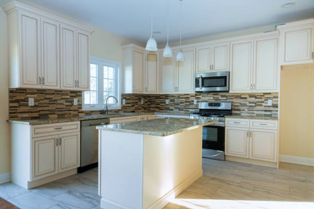 Elegant Kitchen Remodel with Custom Cabinets and Stainless Appliances