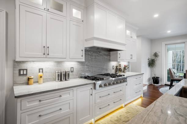 Modern kitchen design featuring sleek cabinetry and elegant local trends