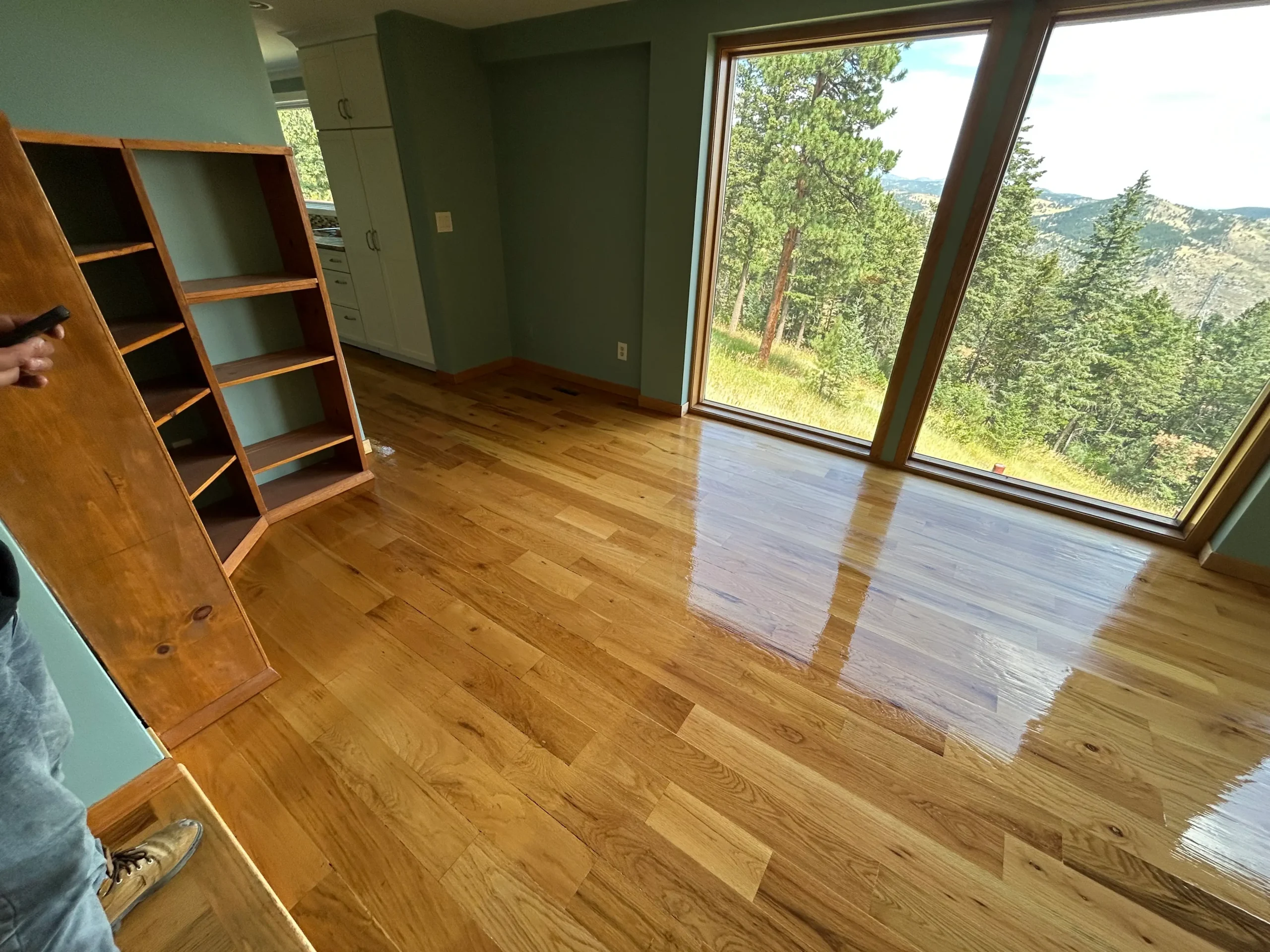 Hardwood floor screening results in Denver Colorado mountain home with dramatic contrast