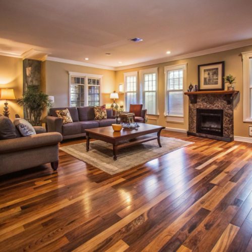 Stylish living room showcasing beautifully sanded and polished hardwood floors