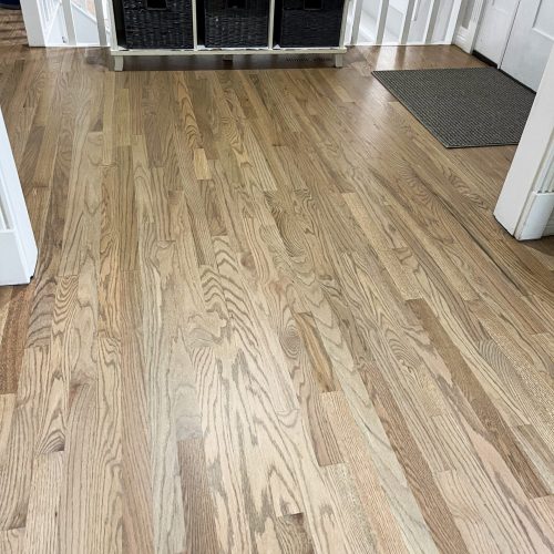 Natural hickory hardwood floors with contrasting tones installed in a modern loft in Parker, Colorado