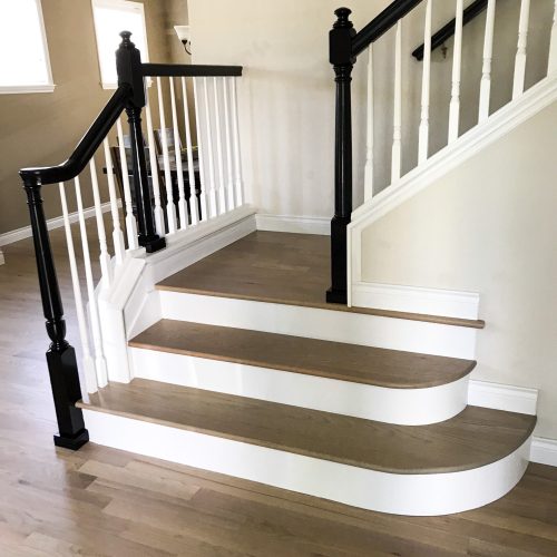 White oak staircase hardwood installation in Denver, Colorado, with a light natural finish