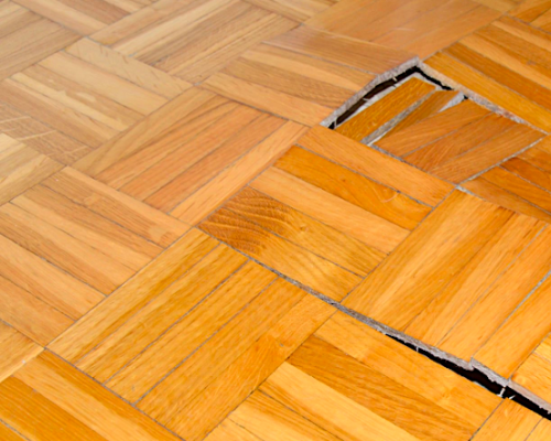 Repairing warped wood floors specialists in Denver and surrounding areas.