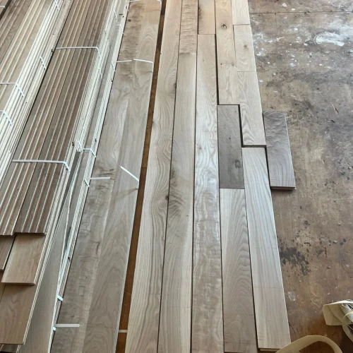 Professional commercial hardwood floor installation Denver restaurant space with custom wide plank oak flooring