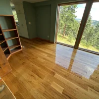 Hardwood floor screening results in Denver Colorado mountain home with dramatic contrast