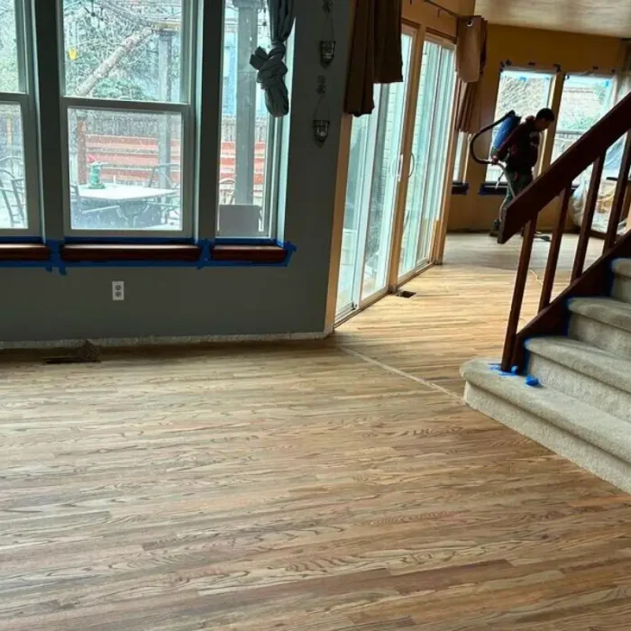 Denver home living room hardwood floor refinishing with oak finish alternative angle