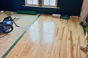 natural-hardwood-floor-installation-progress-denver-navy-accent