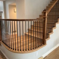 walnut-staircase-installation-hilltop-luxury-curved-design